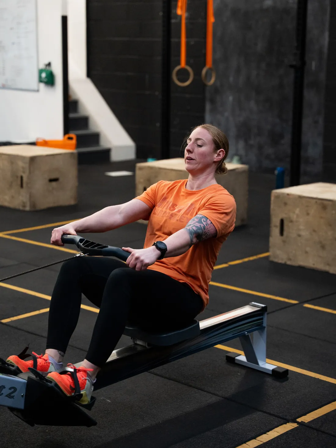 A member rowing on a Concept2 during a class