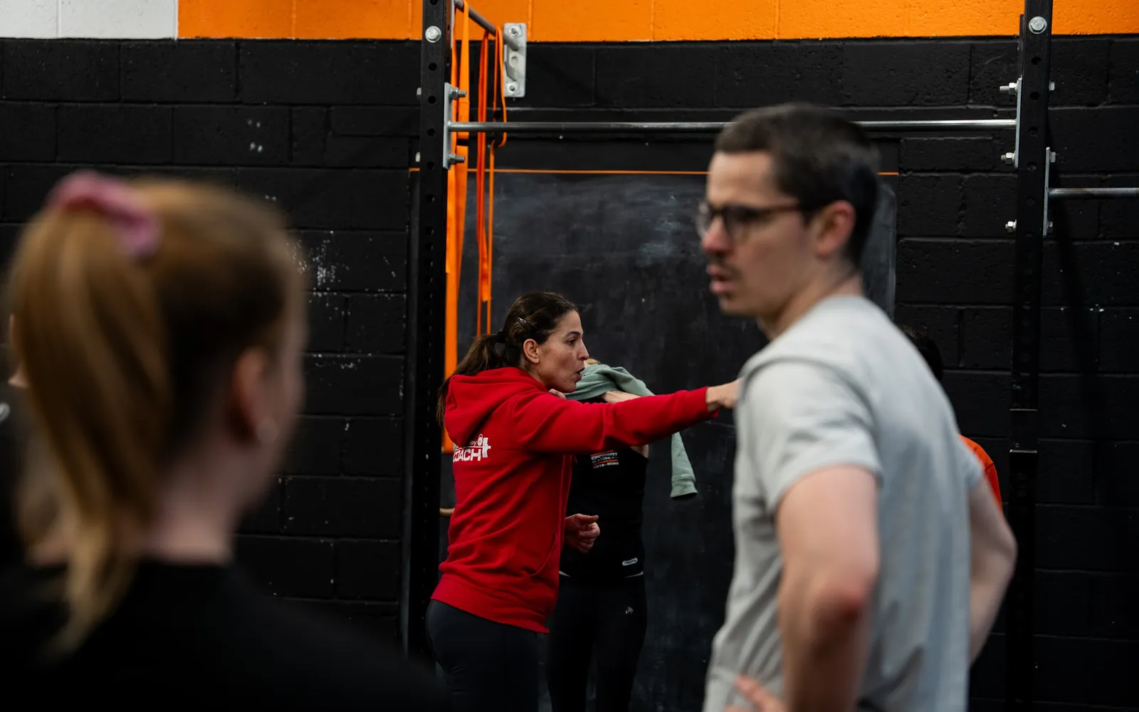 A coach cueing a member mid-session