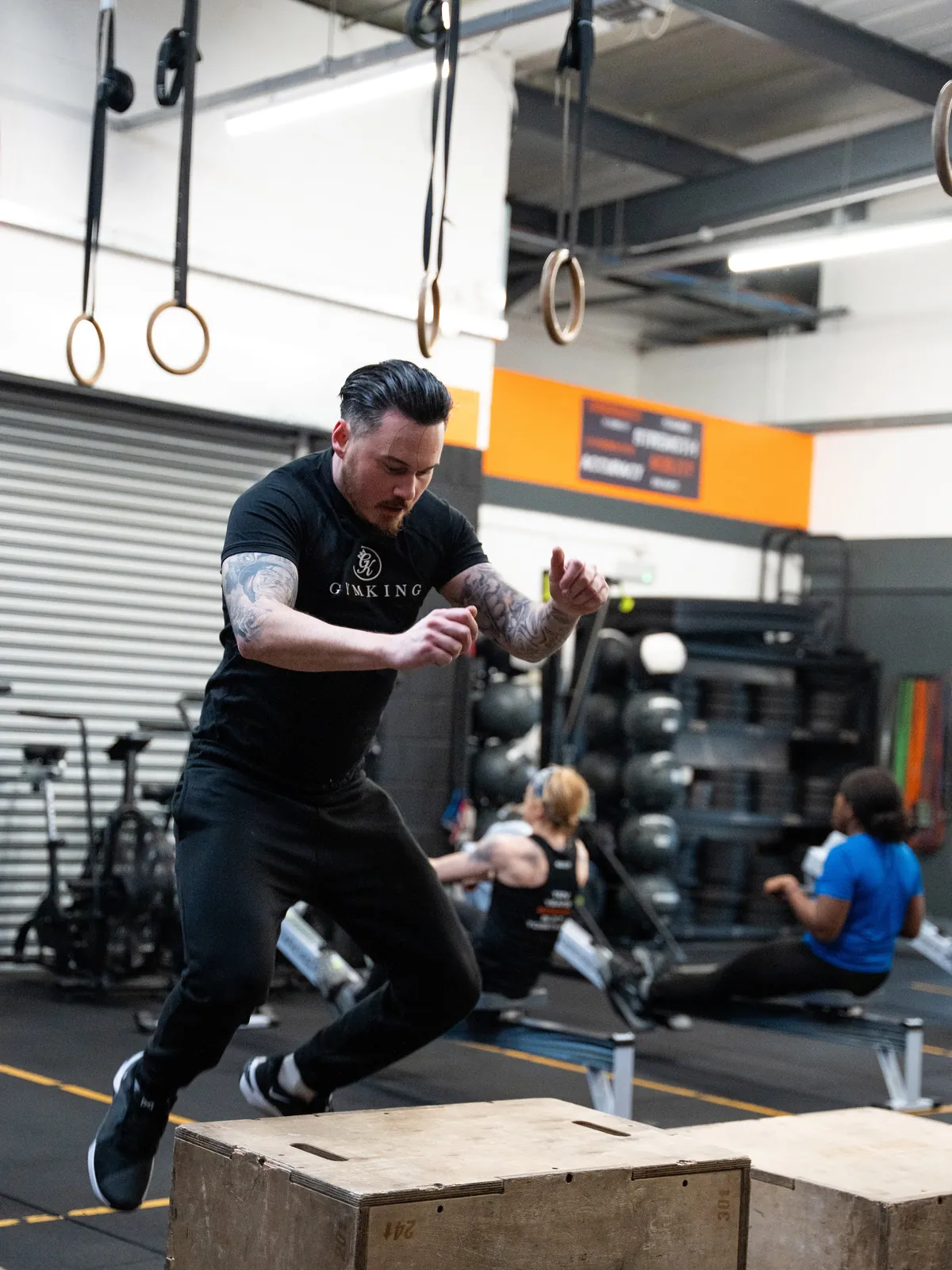 A member mid box jump during a class at CrossFit Bletchley
