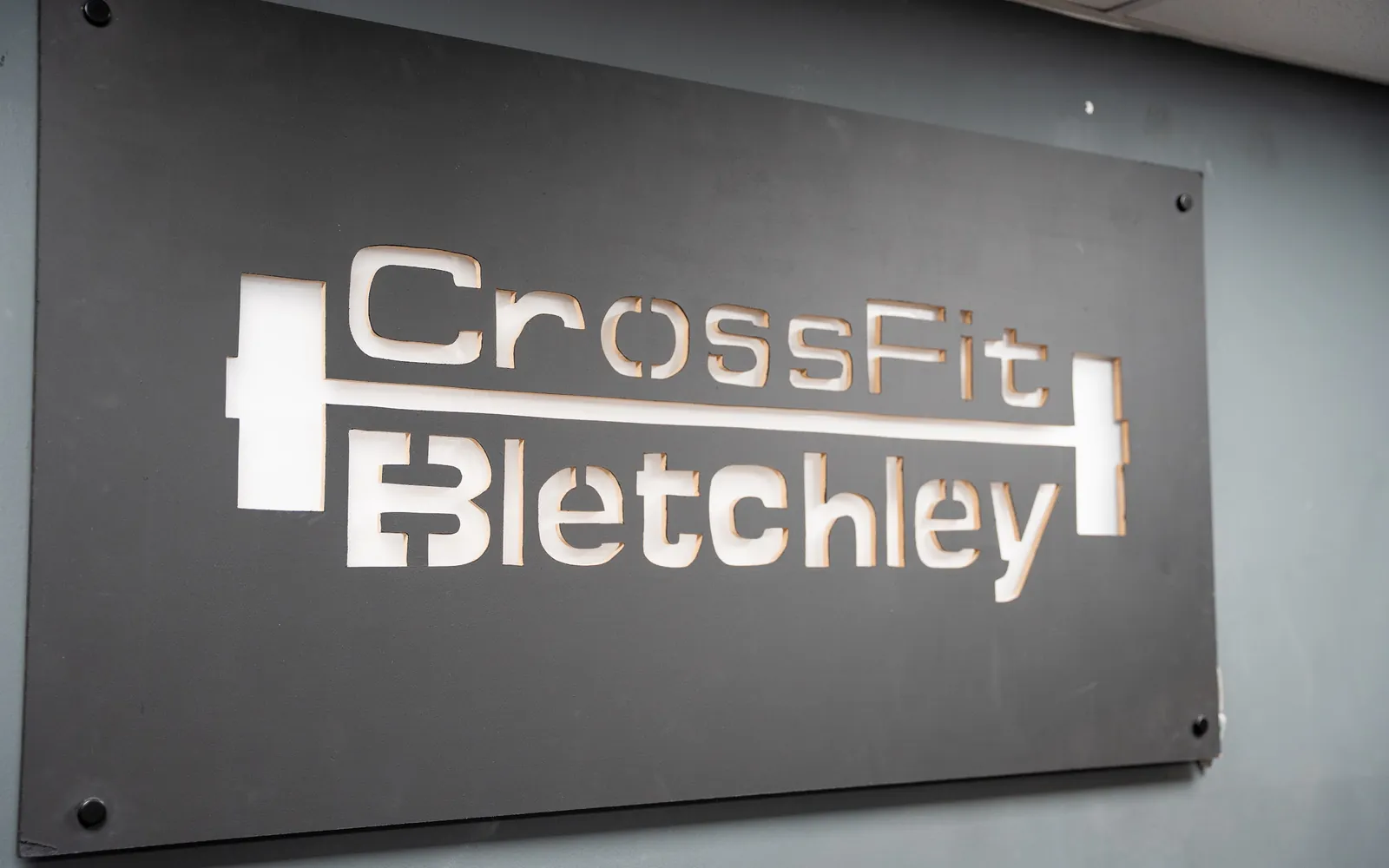 The CrossFit Bletchley sign on the wall at Unit R7